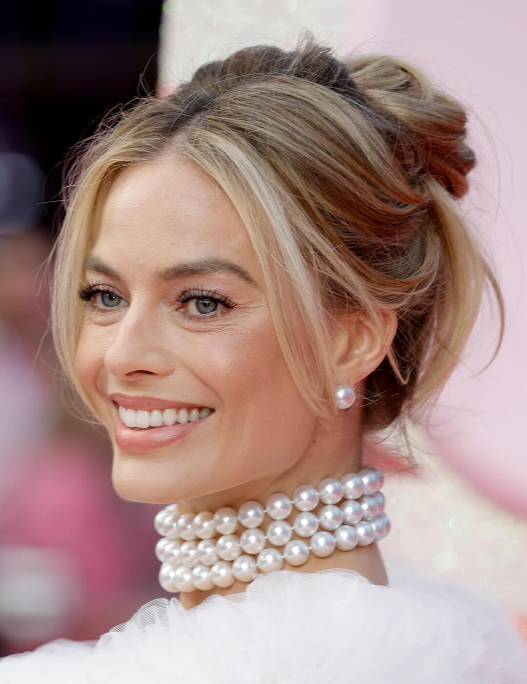 Margot Robbie attends The European Premiere Of "Barbie" at Cineworld Leicester Square on July 12, 2023 in London, England. Mobile