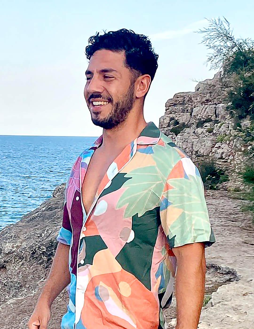 Smiling Oliver Gauci on a cliff Mobile