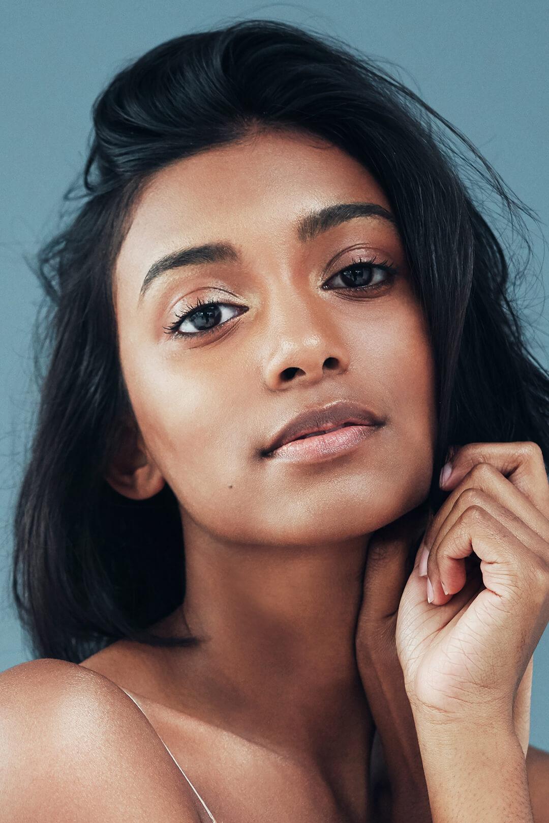 Portrait of a young, beautiful woman with a natural makeup look Desktop