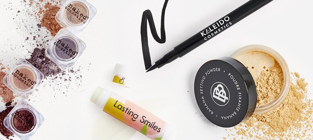 Makeup and skincare products swatched on white background